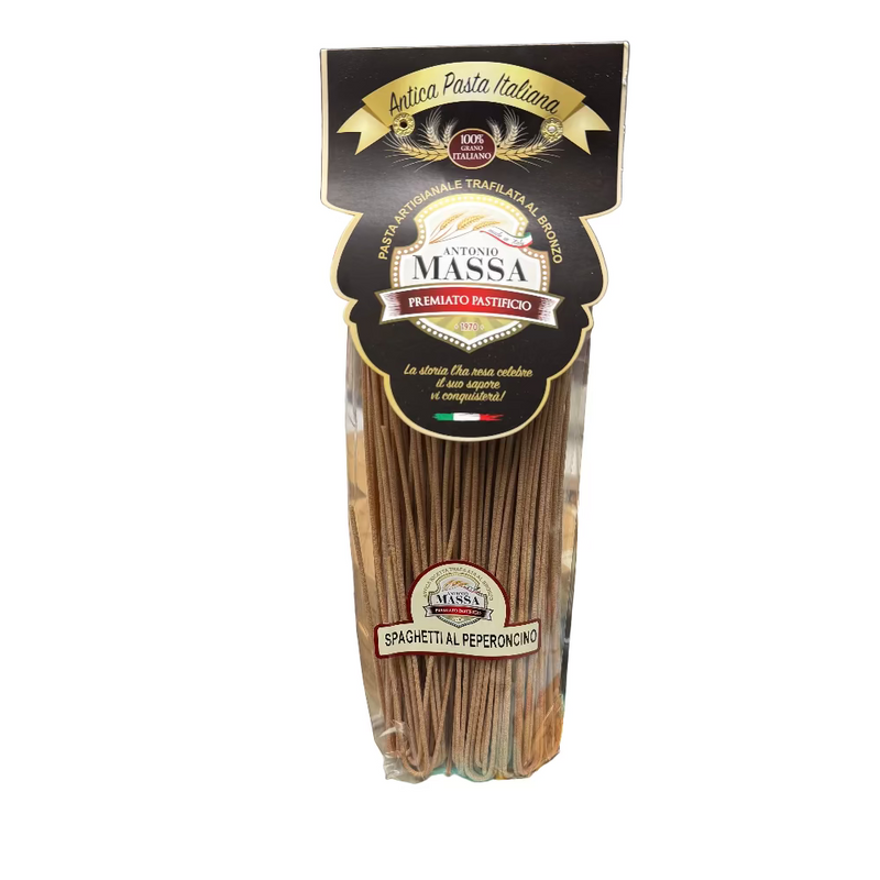 Packaged spaghetti with pepperoni from Antica Pasta Italiana on a cluttered kitchen counter.