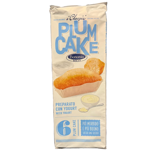 Box of Boninis Dolci Plum Cake on a desk with office items in the background