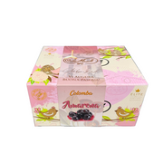 Box of Colombara Amarena Easter cake with decorative design held in a warehouse setting.