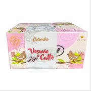 Box of Colombari Vesuvio Caffè coffee with colorful design held by a person in an indoor setting.