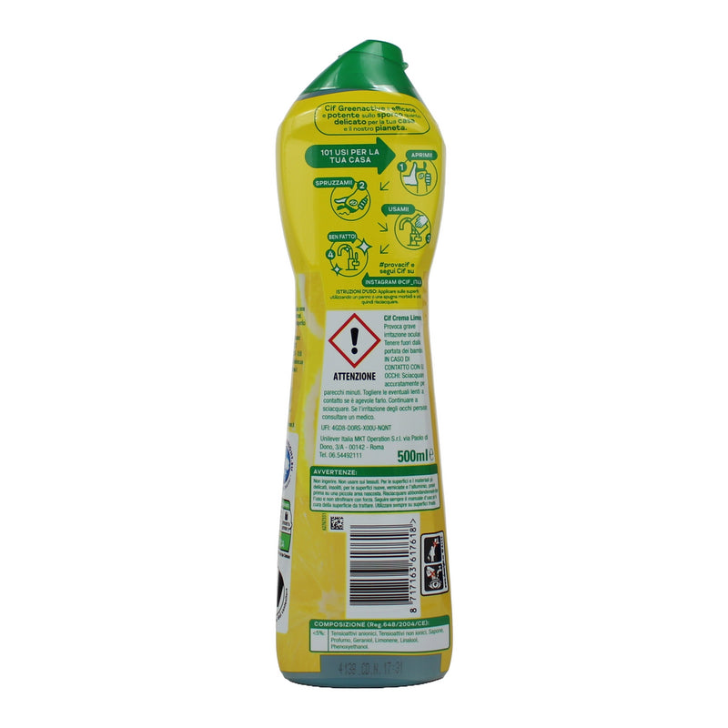 A 500ml bottle of dishwashing liquid shown from the back, featuring a bright yellow label with green accents, a green cap, and a red hazard warning symbol.