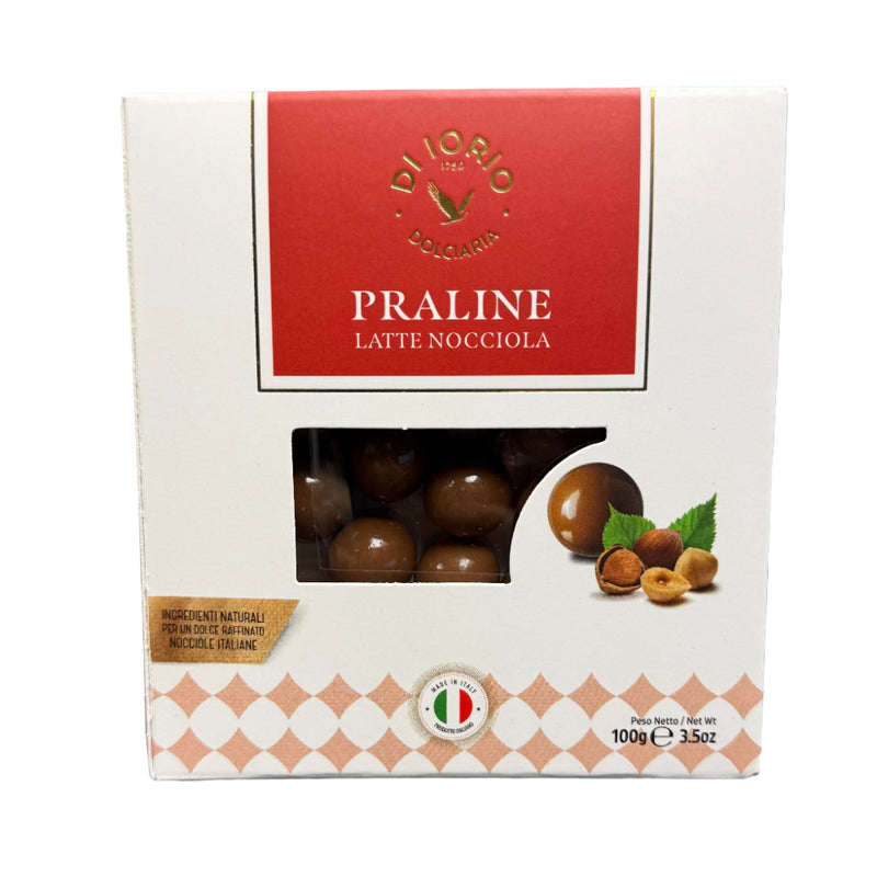 Box of Vicolo Praline Latte Nocciola held in a hand with a blurred background