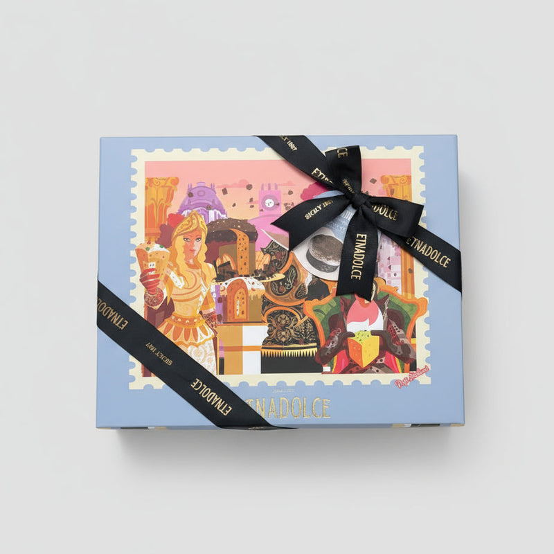 Decorative box with a colorful design and black ribbon on a light gray background