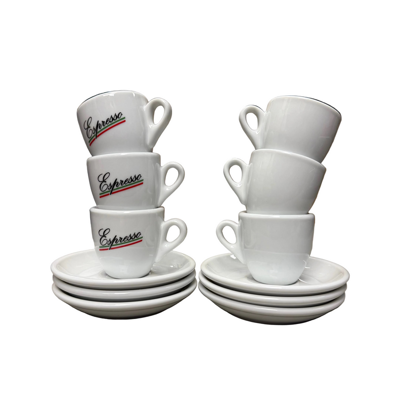 White espresso cups and saucers with 'Espresso' text on a warehouse shelf.