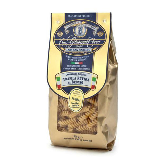 Pasta package with a gold and blue label on a white background