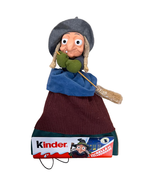 Toy figure of a character from a Kinder Surprise chocolate egg on a white background