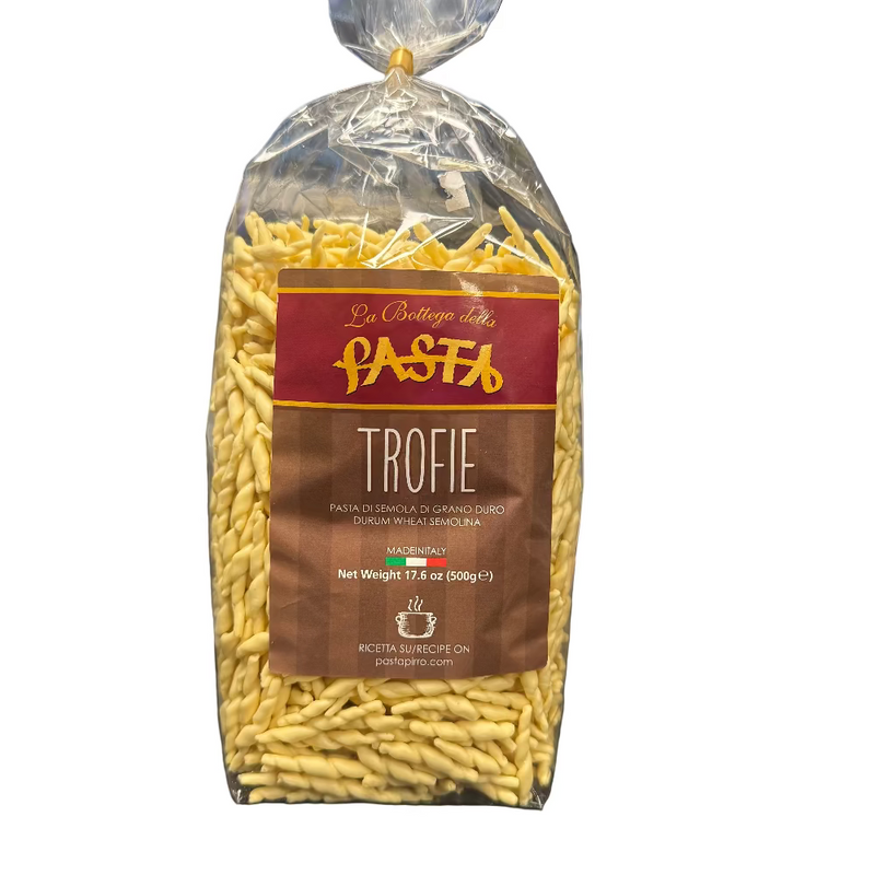 Packaged Trofie pasta with a label on a desk