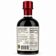Two bottles of Balsamic Vinegar of Modena on a white background