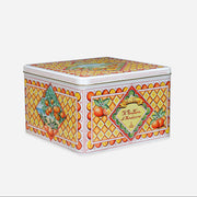 Decorative tin box with colorful design on a white background
