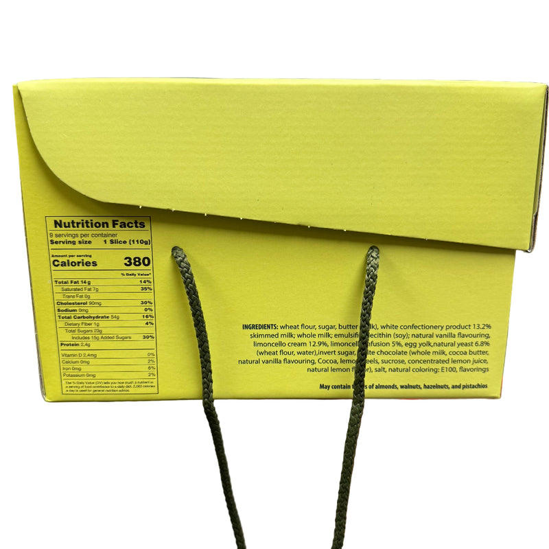 Yellow box with green strings held by a hand, showing nutrition facts label.
