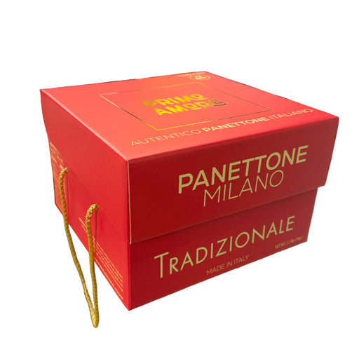 Red Panettone Milano box held by a person in a store setting with workers in blue uniforms.