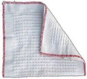 White cloth with red trim on a white background