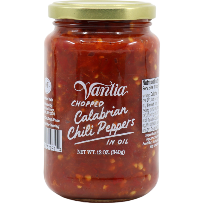 A jar of Vantia Chopped Calabrian Chili Peppers in oil. The label displays the product name and weight of 12 oz (340g).