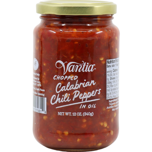 A jar of Vantia Chopped Calabrian Chili Peppers in oil. The label displays the product name and weight of 12 oz (340g).