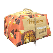 Packaged dessert with 'Verani' branding held in a hand, blurred background