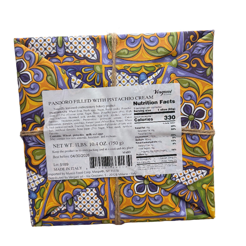 Decorative box of Pandoro filled with pistachio cream held in a store setting