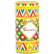 Colorful cylindrical tin with geometric pattern and Dolce & Gabbana branding on a white background