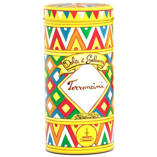 Colorful cylindrical tin with geometric pattern and Dolce & Gabbana branding on a white background
