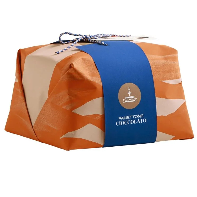 Panettone Cioccolato wrapped in orange paper with a blue ribbon on a white background