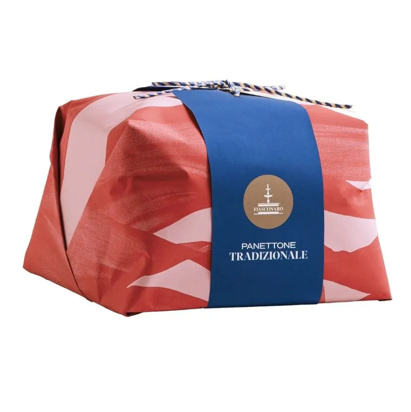 Panettone Tradizionale wrapped in red paper with a blue band featuring a logo on a white background