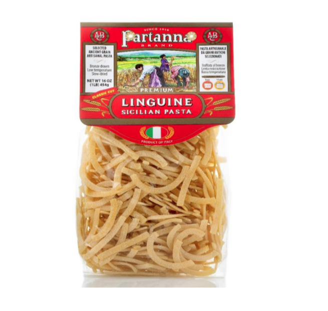 Packaging of Partanna Short Linguine Pasta showing the product name, weight, and an image of the pasta. The background is red with a white transparent panel displaying the pasta.