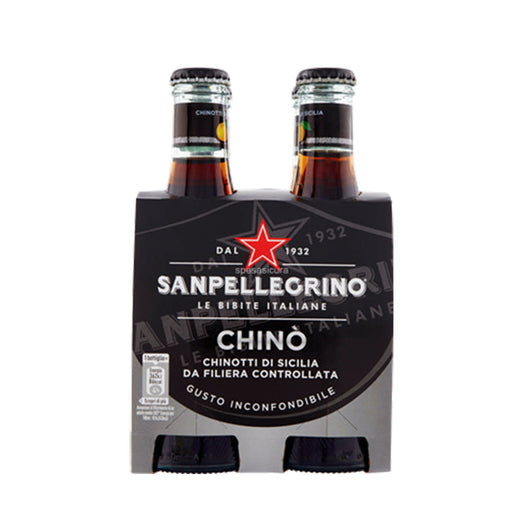 A pack of San Pellegrino Chinotto sparkling water in glass bottles. The packaging is black with the San Pellegrino star logo and the text 'Chinotto di Sicilia' visible.